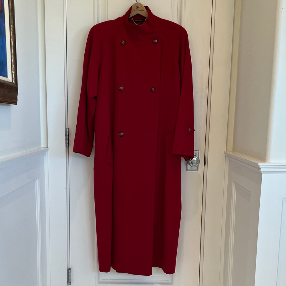 Elegant Sara Roberts turn-your-head red coat